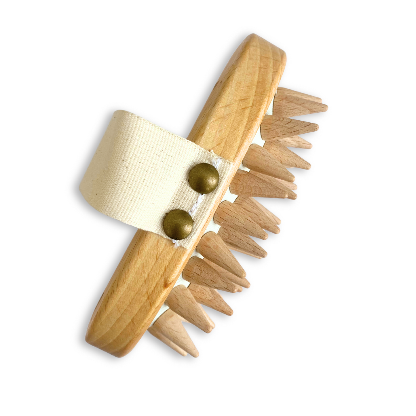 Wooden comb with metal buttons on a white background